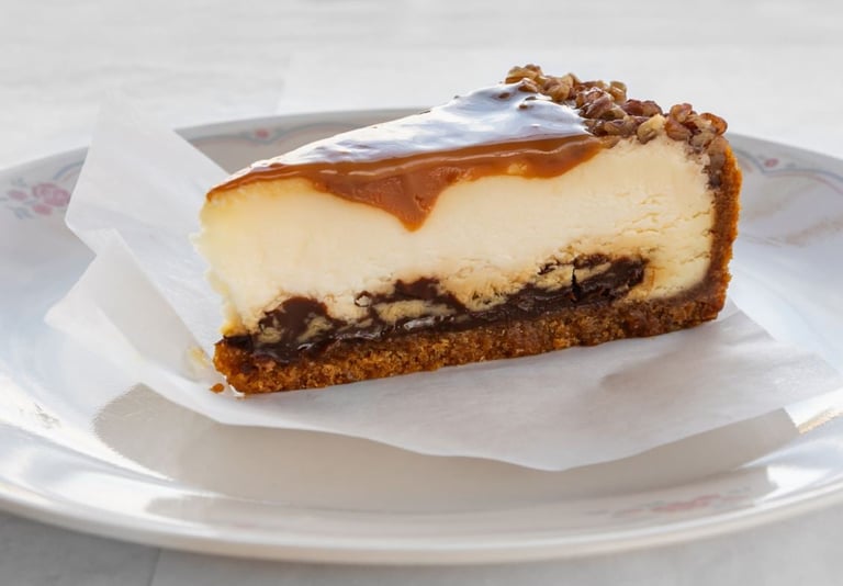 Cheesecake with chocolate swirl and caramel topping