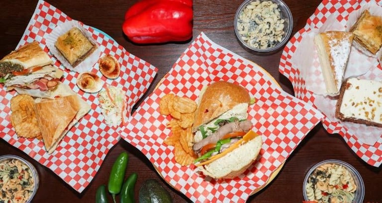 Casual deli food spread with sandwiches and fried chicken