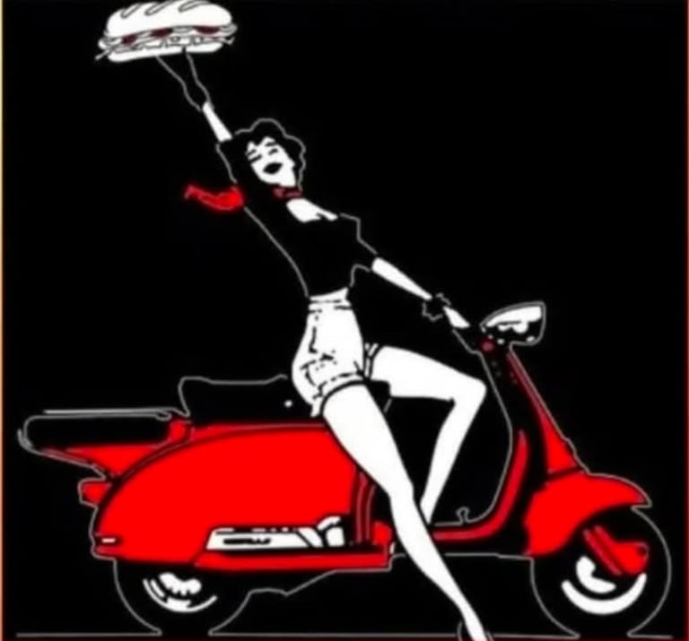 Woman in black top sitting on a red vintage scooter, holding a sandwich above her head against a black background